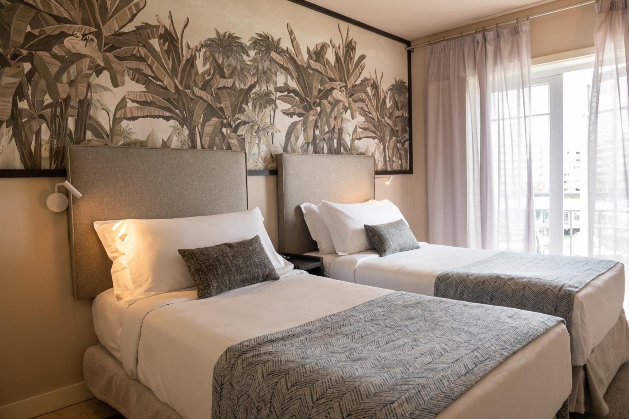 Domes Lake Algarve, Autograph Collection Виламура Экстерьер фото A bedroom at the hotel